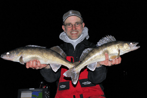 image of Jason Halfen with 2 Walleyes