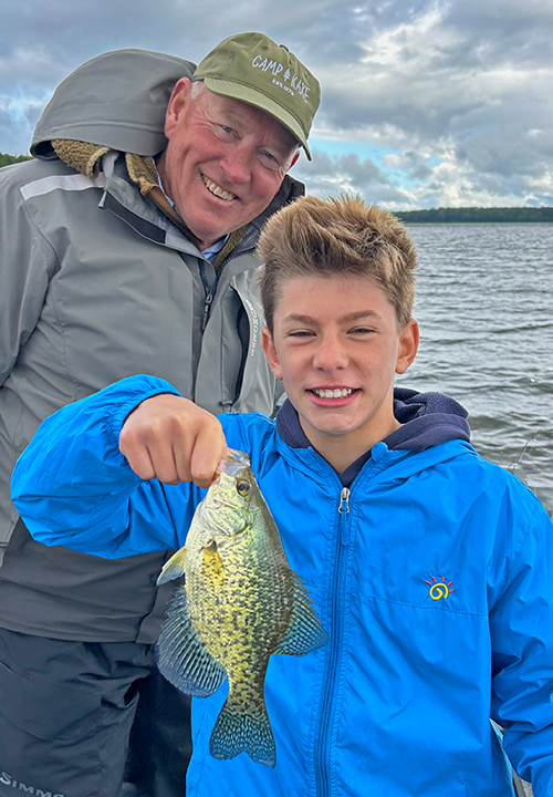 image of Ty Parrish holding big crappie caught with fishing guide Jeff Sundin 