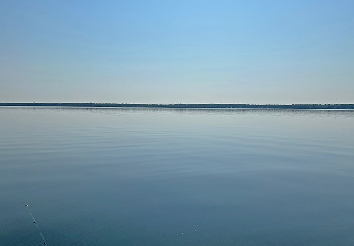 image of flat and calm water on sunny day