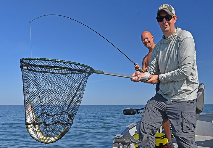 image of Hans Snyder with v=big Walleye caught on Winnibigoshish