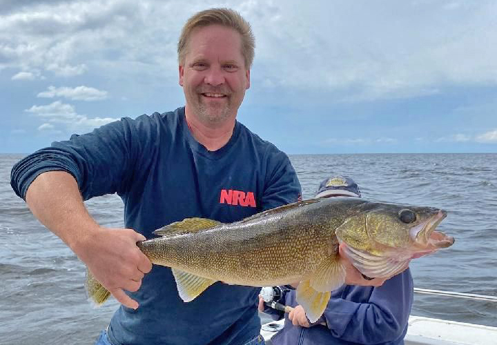 image of veteran fishing at Lake of the Woods during the 2024 pay it forward event