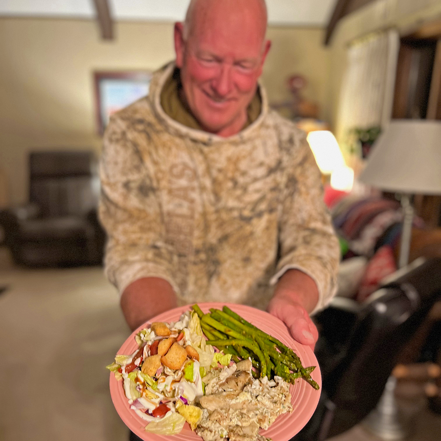 image of Jeff Sundin with prepared dish of Bluegills in Dill Sauce