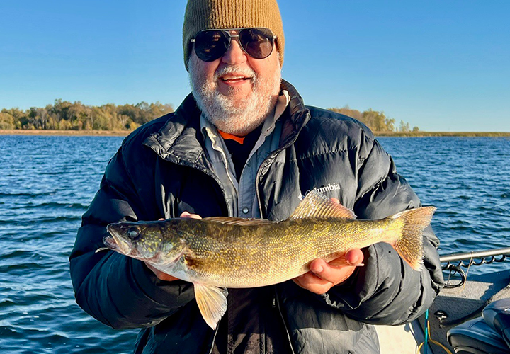 Keeper size Lake Winnie walleye caught by Ken Seufert on fishing cjarter with Jeff Sundin 
