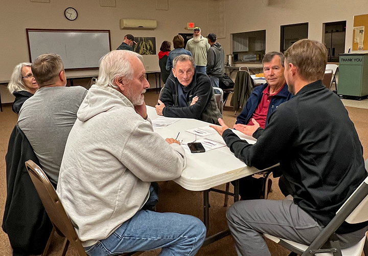 image of attendees at MN DNR fisheries meeting about Sand Lake Walleye Regulations