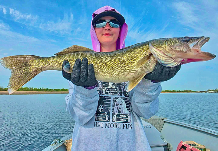 Angler on Lake of the Woods with trophy walleye
