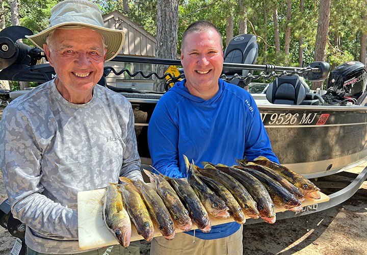 Al and Paul with nice catch of walleyes on fishing charter with Jeff Sundin 