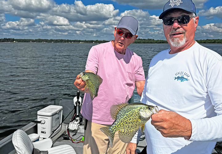 Paul Guanzinni and Jeff Sundin with nice crappie double on Bemidji area lake