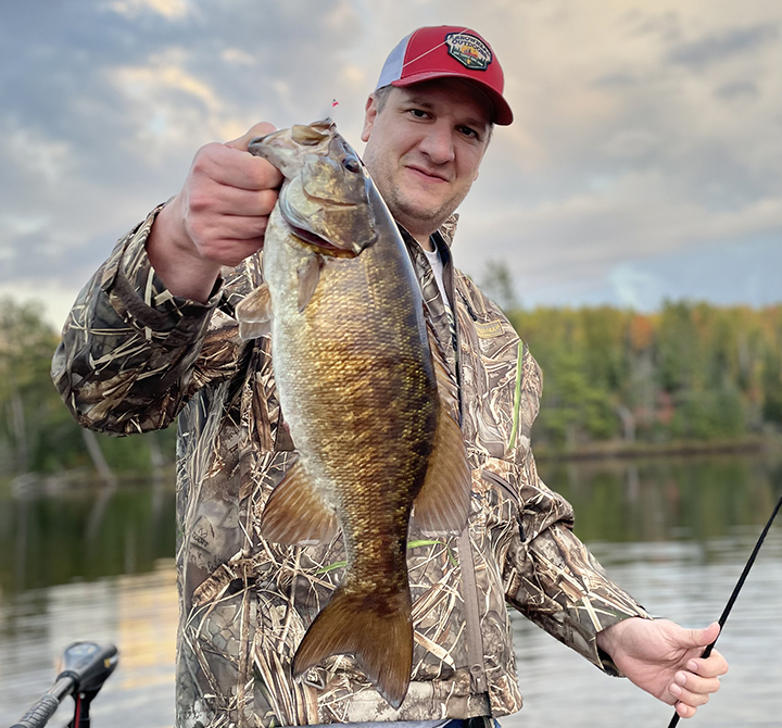 image of Steve Rennenberg with large Smallmouth Bass